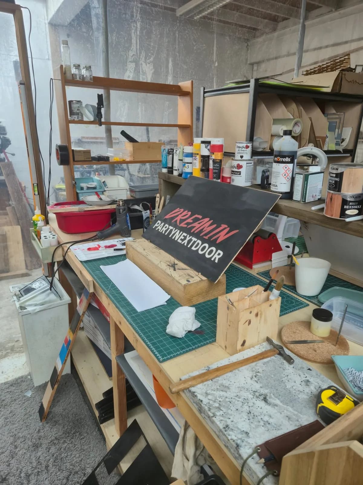 Workshop interior with bench tools and timber stock